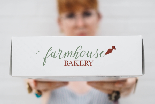 Farmhouse Bakery logo on a bakery box
